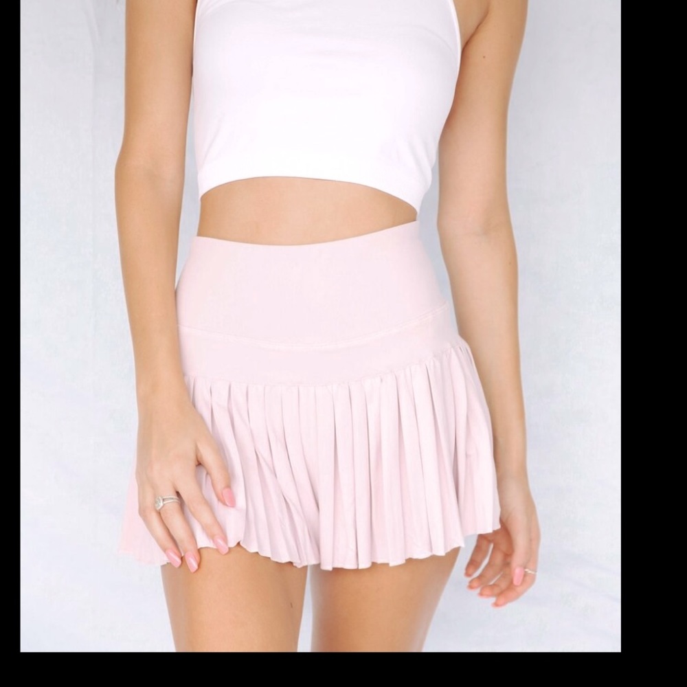 Brand new never worn pleated baby pink golf skirt size medium